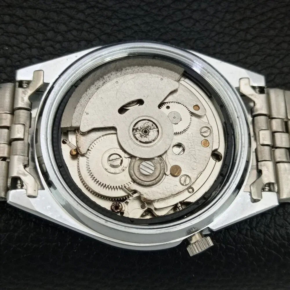 Vintage 1983 Seiko Automatic Mens Silver Watch W/daydate & Red accents